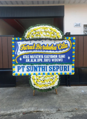 Papan Bunga Duka di Abian Tubuh Baru